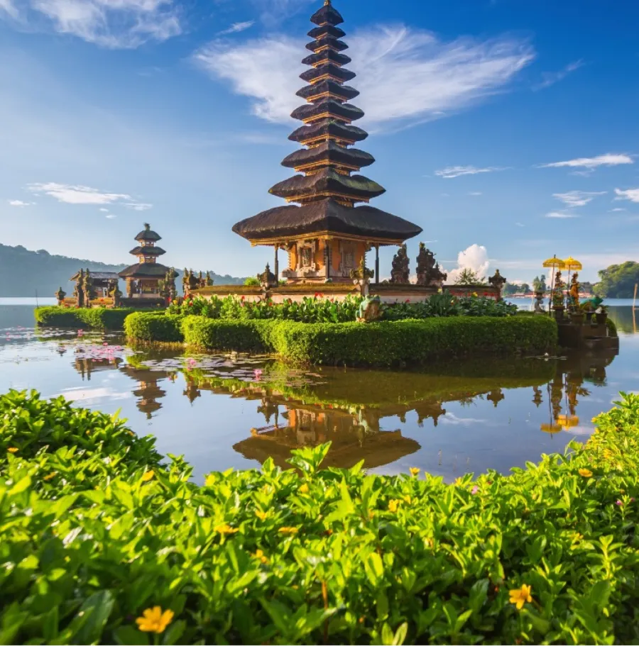 A temple on the edge of a mountain lake in Bali