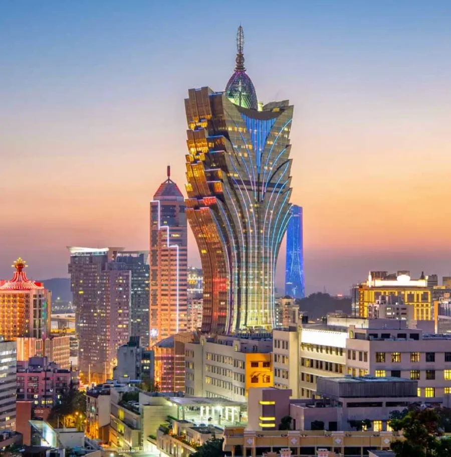 The Macau skyline lit up at dusk