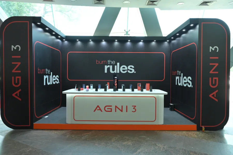 The AGNI 3 launch stage with the line “burn the rules”